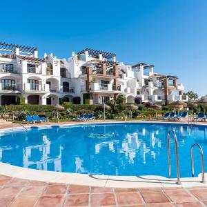 Sunny balcony with pool by Costarentals - Ref M52