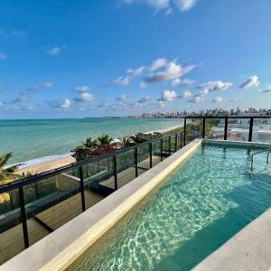 Restinga by Xtay - Studios com piscina e academia, pé na areia em João Pessoa