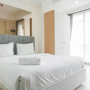 Best Studio with Pool View at Menteng Park Apartment By Travelio