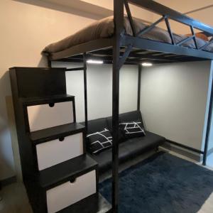Spacious studio at fairview quezon with VERY FAST WIFI infront of SM