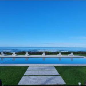 Casa de Praia - Alto Padrão -Condomínio Frente Mar