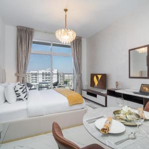 Vogue Vacation Homes, Arjan Jwelz by Danube near Miracle and Butterfly Garden, Studio Apartment with Balcony and Vibrant Community View, Access to all Amenities