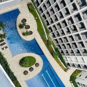 Affordable Staycation Condo with WIFI near MOA and Airport