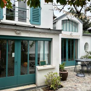 Petite maison calme dans un jardin