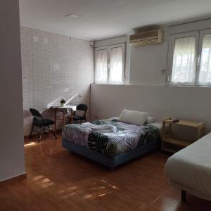 Apartamento y Habitaciones El Colmenar