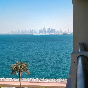 Ambient 1BR Apartment On The Beach at 5 Star Resort