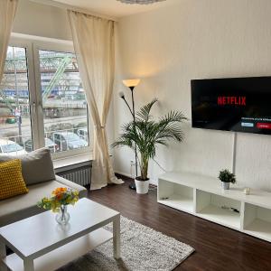 City Apartment 5 min A46 - Parkplatz,Wifi,Netflix,Self check-in