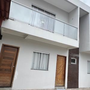 Quarto com banheiro privado em casa de família 15km de Belém