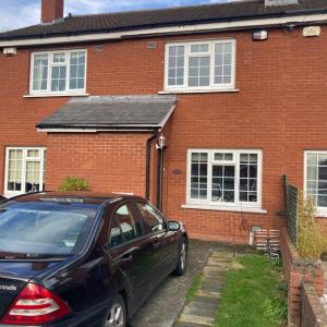 Entire Terraced two story redbrick house with parking in secluded cul de sac