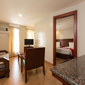 MJ Hotel and Suites