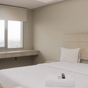 Nice Studio at Gateway Park LRT City Jatibening Apartment By Travelio