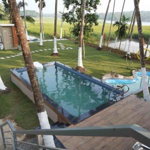 Aaram kumaramangalam lake villa
