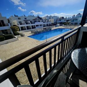 Pool view studio, shaded balcony