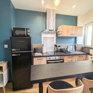 Studio moderne et calme au centre-ville avec parking sécurisé - FR-1-591-723