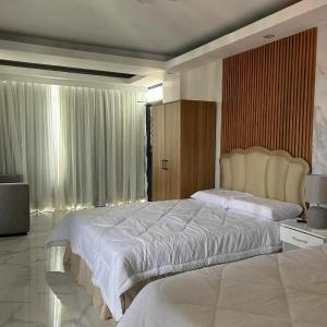 Benny's Hotel-Inspired & Condo-Inspired Rooms and Pool