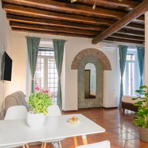 Quiet Trevi Fountain Apartment with patio and backyard