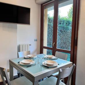 Monolocale con giardino privato e cucina completa
