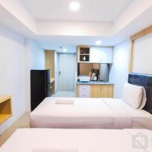 Comfort Studio at De Prima Apartment By Travelio