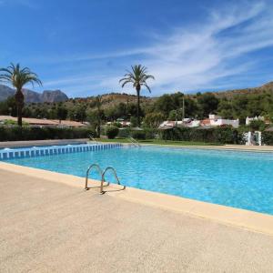 Casita con piscina comunitaria