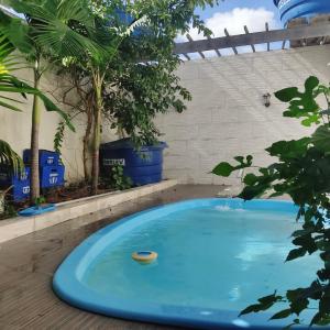Casa com piscina e ar condicionado