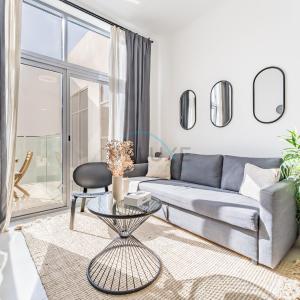 Balcony Offering Community Views 1BR with Assistant Room, Walking Distance to Community Park , Pantheon Elysee , Jumeirah Village Circle by Deluxe Holiday Homes