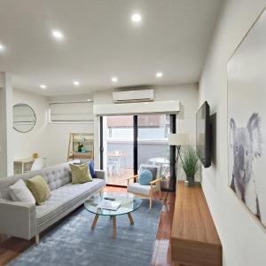 Luxury Beachside Townhouse - Walk to Beach - Private Rooftop Terrace