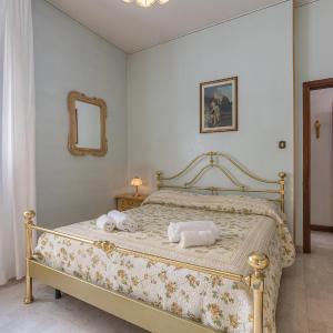 GuestHost - Maggiore Hospital & Ara Stadium Apt