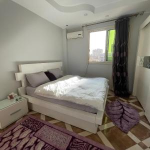 Purple Room in a sharing apartment