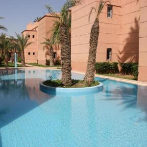 Riad avec jardins et piscines