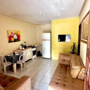 Suíte privativa com cozinha completa, ar e Wi-Fi