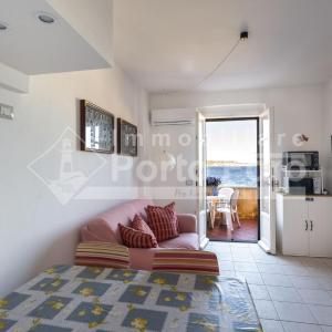 3 Centro - Bilocale con terrazza vista mare Porto Faro
