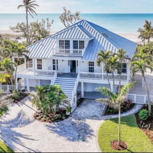 Stunning Beachfront Villa with Heated Pool