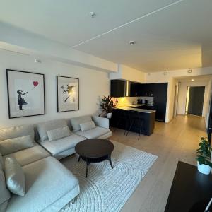 Modern three-room apartment, private terrace and roof terrace