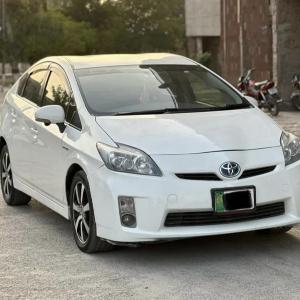 White car - TOYOTA PRIUS MODEL 2010