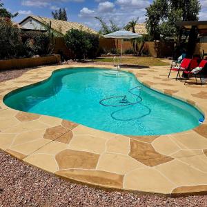 Cozy home with pool, fire table, BBQ, RV parking