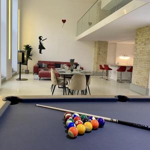 Loft With Pool Table, Kitchen Island & Gallery