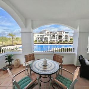 Charming apartment with a pool and golf view