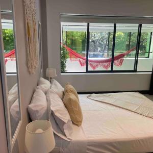 Apartamento con balcón y hamaca en zona rosa laureles 301