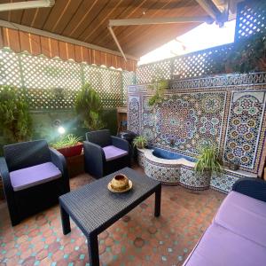 Appart bien équipé avec jardin privé à California
