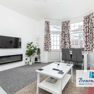 Bournecoast - Apartment with patio garden near sandy beaches and shops - FM9618