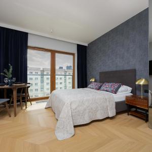 Modern Studio in Wola with Air Conditioning by Noclegi Renters