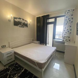 ALEXSANDR apartment в доме с ТРЦ РОДОС море в пешей доступности