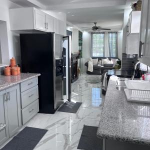 11onEssex1 in the heart of Kingston Ja DN Vacations