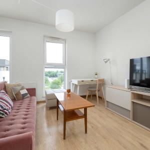 Cozy Apartment Wrocław with Garage Access by Noclegi Renters