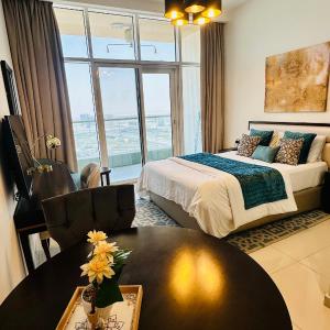 Stunning Studio at JVC Damac Ghalia - Msgetaways