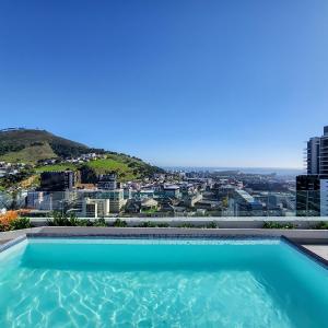 Sky High Views at The Rubik with Rooftop Pool