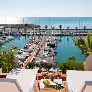 Stunning sea views over marina with swimming pool