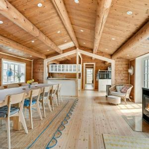 Log House Close To The Sea And Coastal Towns