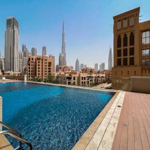 Vogue Downtown Dubai Bellevue tower walkable to burj khalifa and the dubai mall Amazing Burj view from the swimming pool