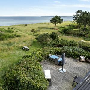 Beach House With Wild Roses And Sunbeams
